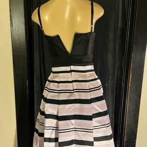 Special occasion dress, beautiful sweetheart top with peekaboo stomach.